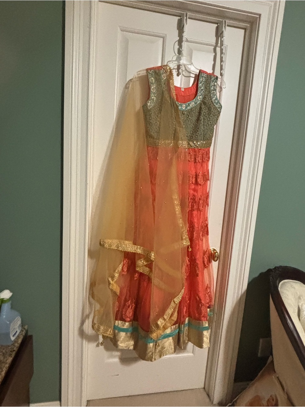 Indian Formal Lehenga in Coral with Gold and Teal Accents